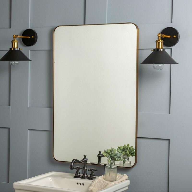 مرآة حائط بإطار حديدي مستطيل الشكل